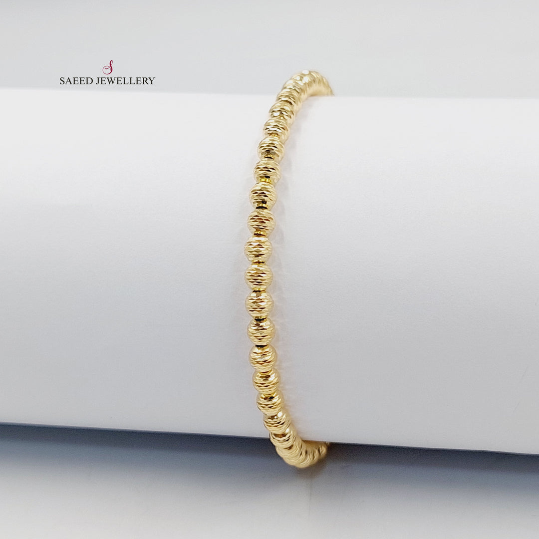 18K Gold Zircon Studded Balls Bracelet by Saeed Jewelry - Image 1