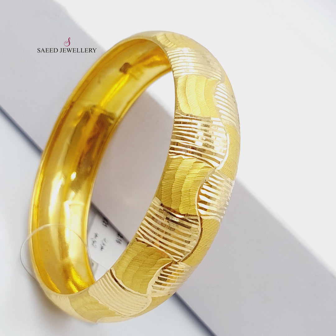 21K Gold Bold Bangle by Saeed Jewelry - Image 1