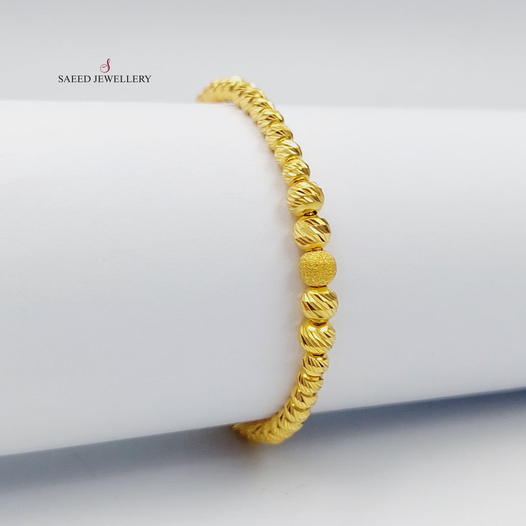 21K Gold Children's Balls Bracelet by Saeed Jewelry - Image 1