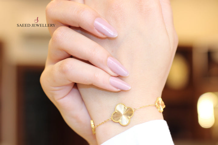 21K Gold 21K Fancy Clover Bracelet by Saeed Jewelry - Image 1