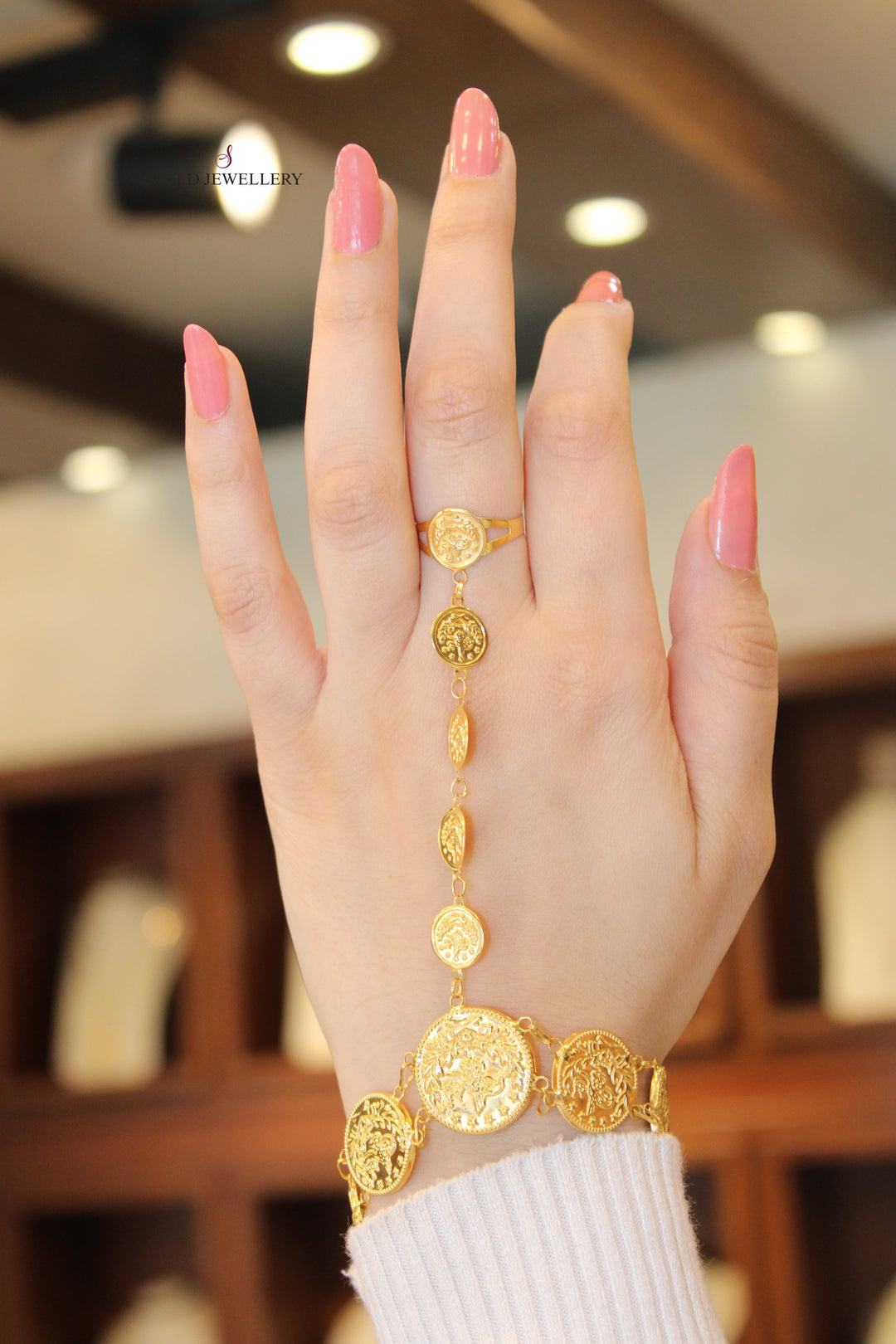 21K Gold Lirat Hand Bracelet by Saeed Jewelry - Image 1