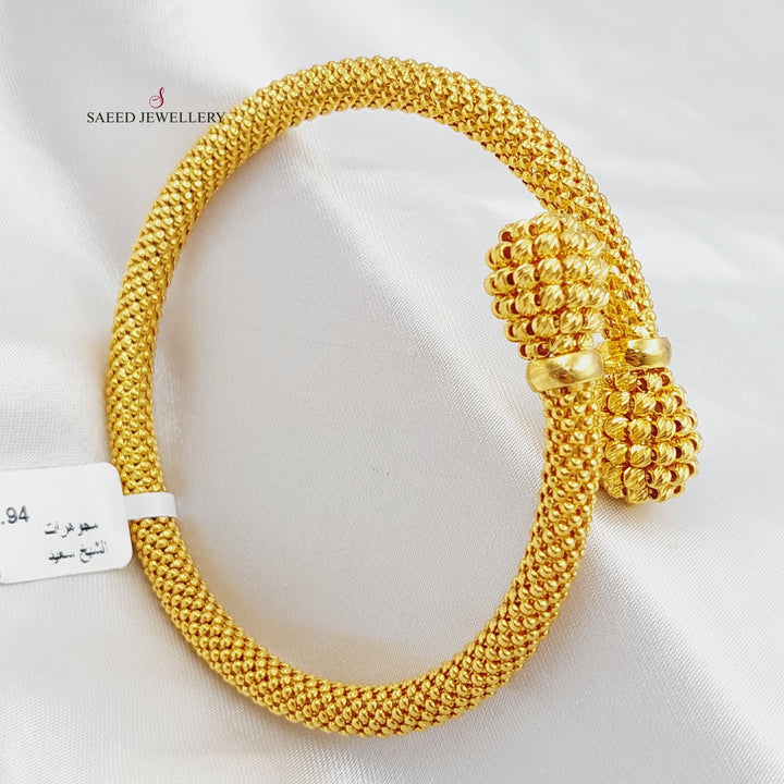 21K Gold Twisted Bangle Bracelet by Saeed Jewelry - Image 1