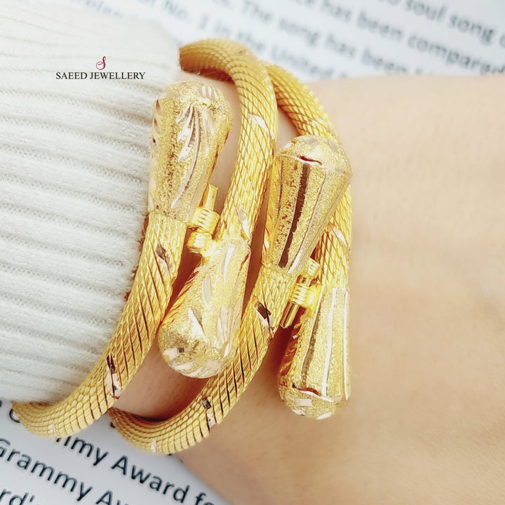 21K Gold Twisted Bangle Bracelet by Saeed Jewelry - Image 2