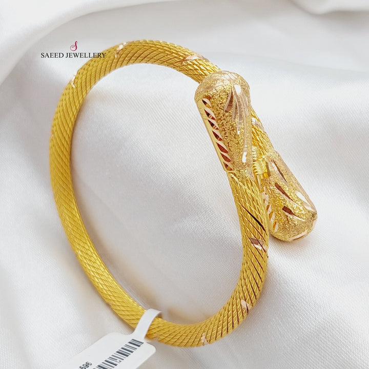 21K Gold Twisted Bangle Bracelet by Saeed Jewelry - Image 1