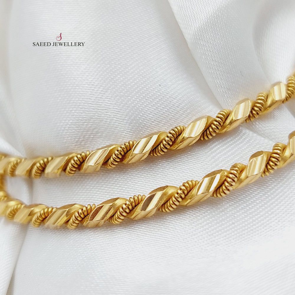 21K Gold Twisted Solid Bangle by Saeed Jewelry - Image 2