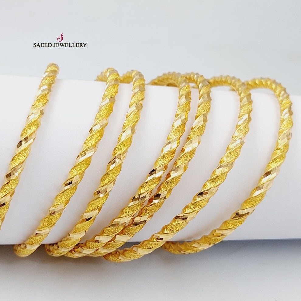 Hollow Twisted Bangle Made of 21K Yellow Gold by Saeed Jewelry-27264