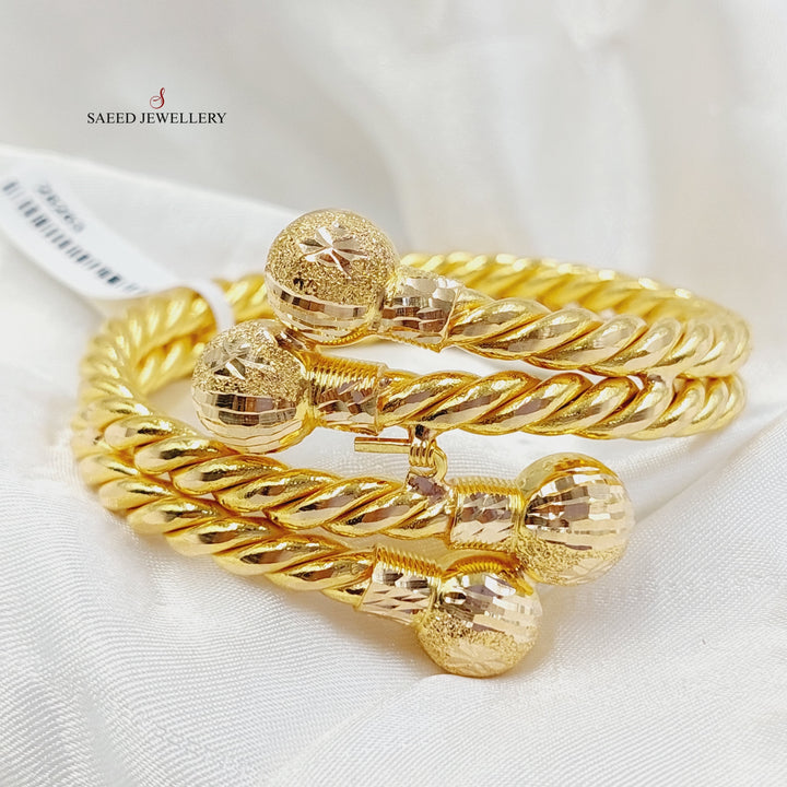 21K Gold Hollow Twisted Bracelet by Saeed Jewelry - Image 1