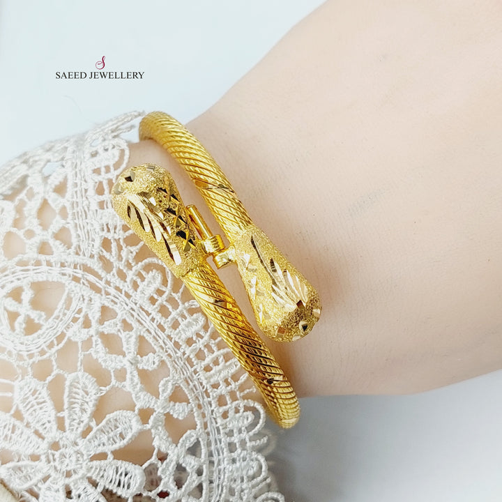 21K Gold Twisted Bangle Bracelet by Saeed Jewelry - Image 2