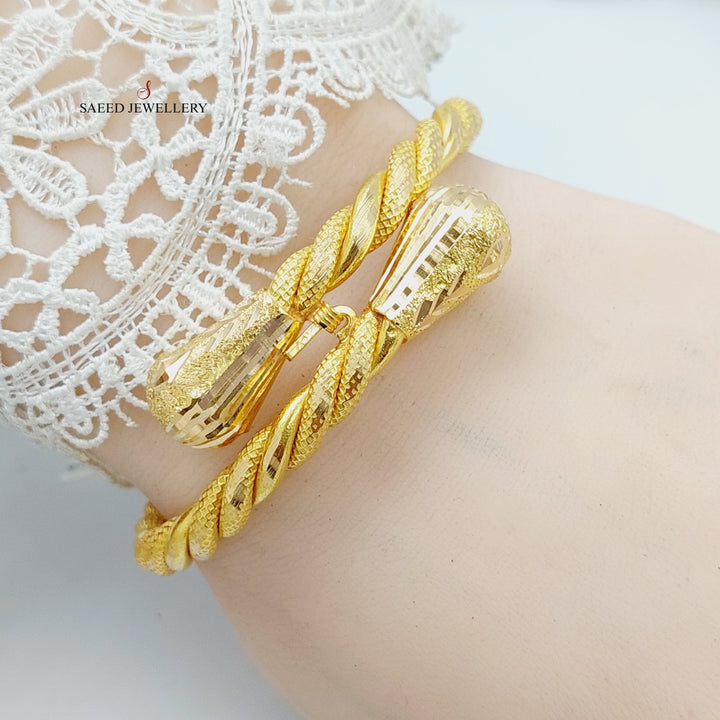 21K Gold Twisted Bangle Bracelet by Saeed Jewelry - Image 9